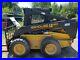 2003_New_Holland_LS180_Skid_Steer_with_576_hrs_two_buckets_forks_augers_01_jq