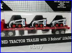 Bobcat Flatbed Tractor Trailer with 3 Blue Skid Diecast 150 Scale Model Toy NIB